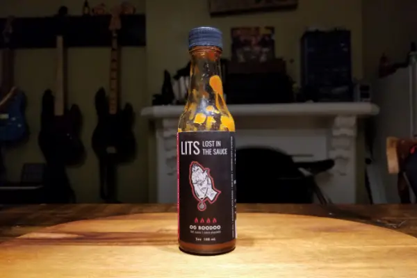 A bottle of Lost In The Sauce OG Boodoo
