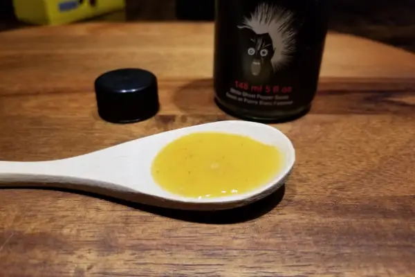 The Banshee hot sauce on a spoon to show texture made by Steel City Sauce Co
