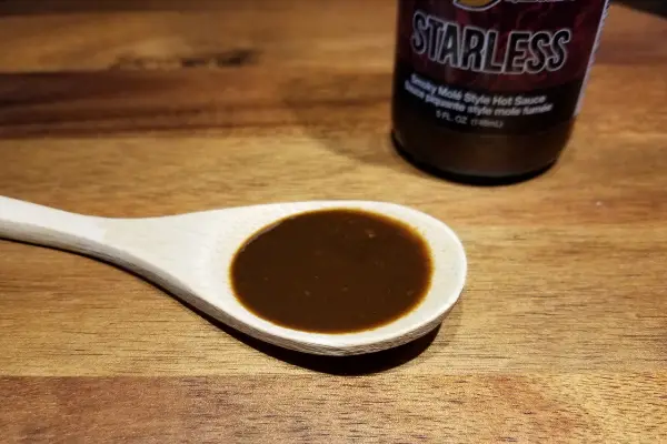 Hurt Berry Farms Starless Mole sauce on a spoon.