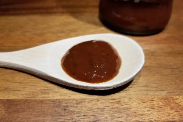 Rootham's red crimson Hot Sauce on a spoon
