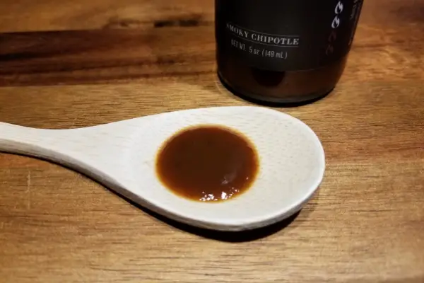 Smoky Chipotle hot sauce on a spoon