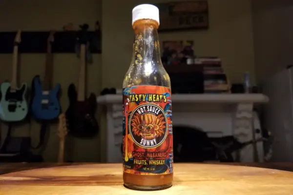 A bottle of Tasty Heat's Sunny habanero hot sauce