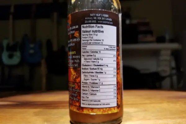 The nutritional label on a bottle of Tasty Heat's Sunny hot sauce