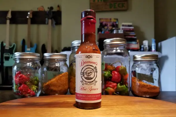A bottle of Big Smoke Chipotle by Dawson's Hot Sauce