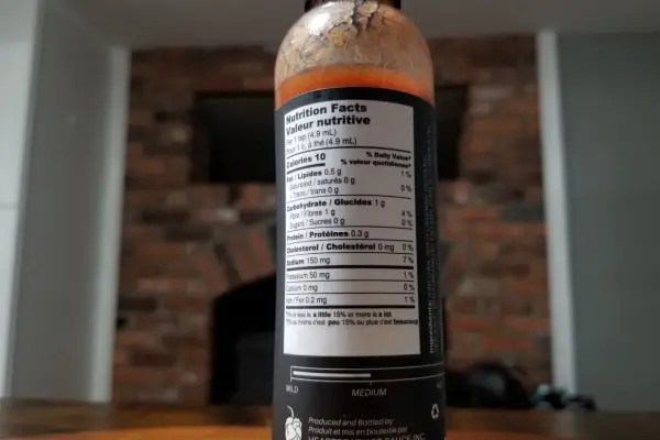 The nutritional label on a bottle of Poirier's Louisiana Hot Sauce by Heartbeat Hot Sauce