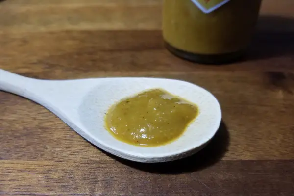 Tijuana Tom's Garlic Lovers hot sauce on a spoon to show texture