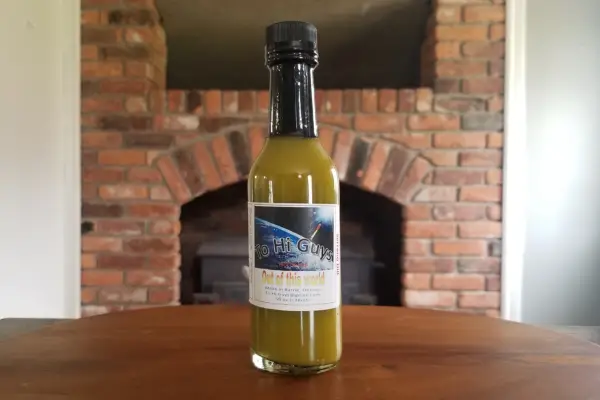 A bottle of Serrano Dill by To Hi Guys Hot Sauce