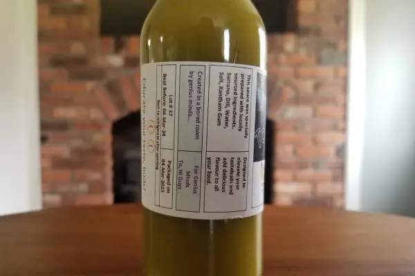 The back of the label of a bottle of Serrano Dill