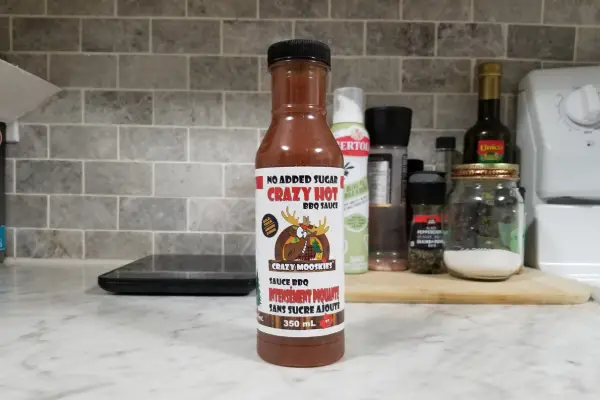 A bottle of Crazy Mooskies Crazy Hot BBQ Sauce