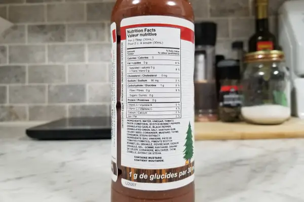 The nutritional label on a botle of Crazy Mooskies Crazy Hot BBQ Sauce