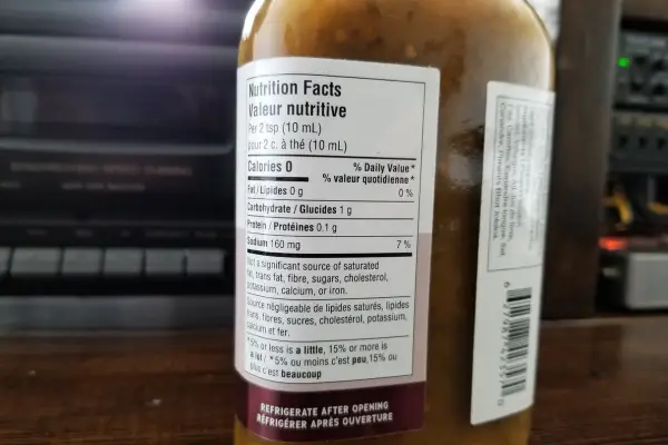 The nutritional label on a bottle of Nuclear Bacchanal hot sauce from Firecracker Pepper Sauces