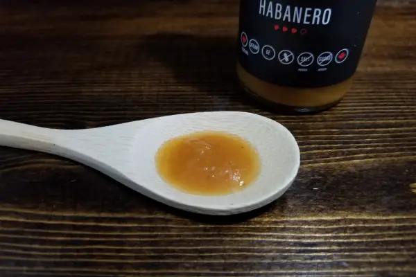 No. 7 Mexican Hot Sauce Habanero on a spoon to show texture