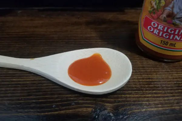 Cholula Hot Sauce On A Spoon