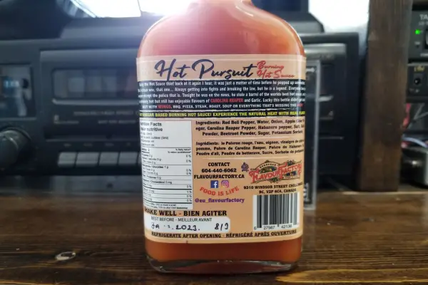 The back label of a bottle of Hot Pursuit hot sauce