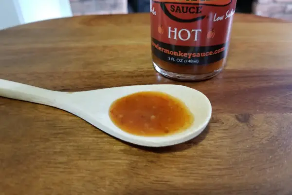 Howler Monkey Hot sauce on a spoon for texture