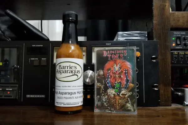 A bottle of Barrie's Asparagus Hot Asparagus Hot Sauce