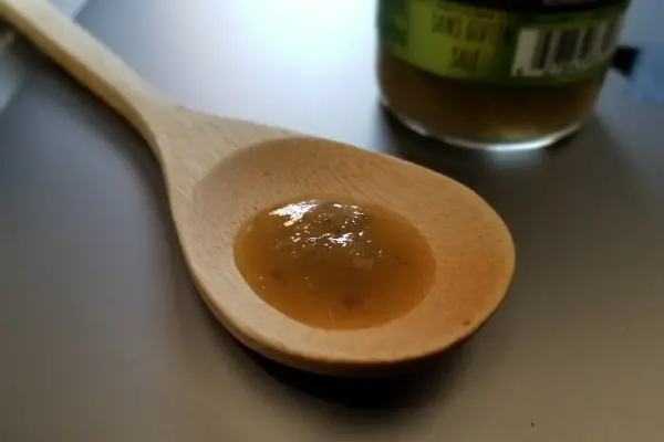 Cucumber Habanero by Out Of The Box Snacks on a spoon to show texture.