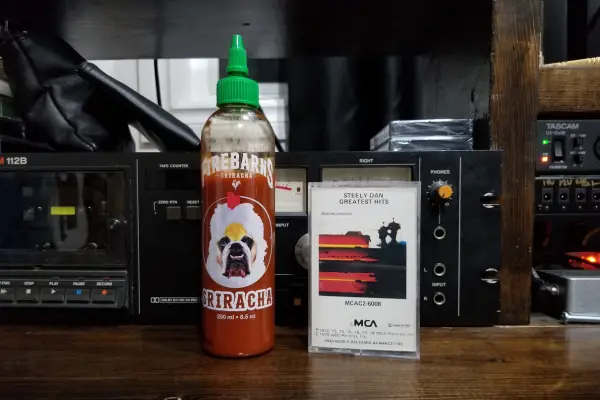 A bottle of Sriracha sauce by Firebarns hot sauce