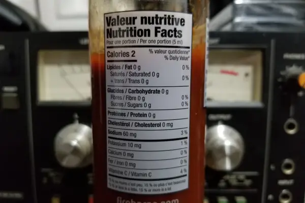 The nutritional info on a bottle of Firebarns Sriracha sauce