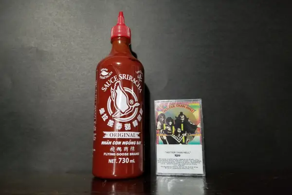 A bottle of Flying Goose Brand Sriracha hot sauce