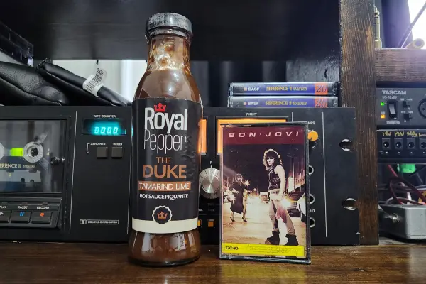 A bottle of The Duke by Royal Pepper Hot Sauce