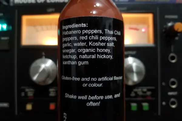 The ingredients label on a bottle of Holy #@%! Fajita Sauce by Six's Kitchen