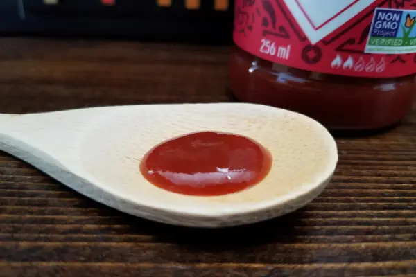 Tabasco Sriracha Sauce on a spoon to show texture