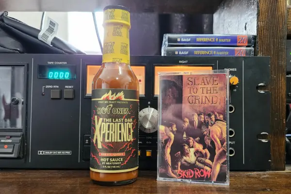 A bottle of The Last Dab Xperience hot sauce by Hot Ones