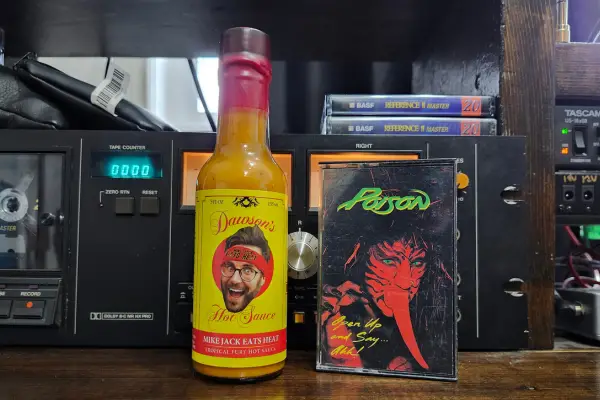 A bottle of Tropical Fury Hot Sauce by Dawson's Hot Sauce and Mike Jack Eats Heat.
