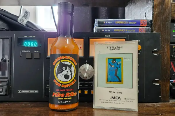 A bottle of Piko Riko Hot Sauce by Piko Peppers