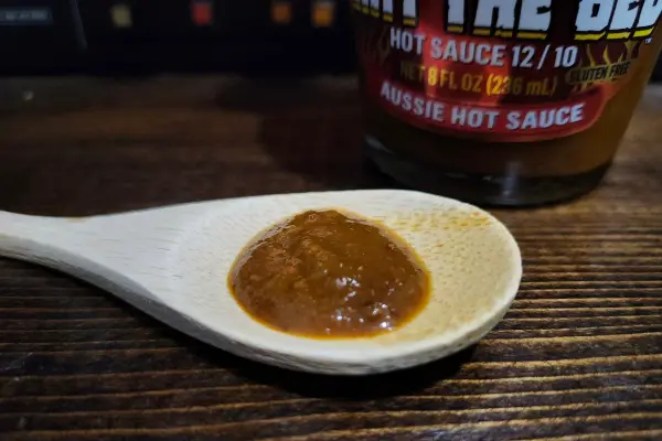 Bunsters Shit The Bed hot sauce on a spoon to show texture