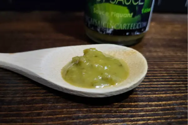 Lush hot sauce on a spoon to show texture
