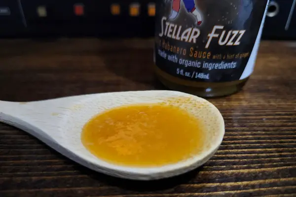 Stellar Fuzz by Funky's Hot Sauce Factory on a spoon to show texture