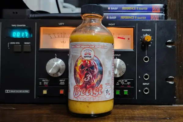 A bottle of Beast 3 hot sauce by the Capsaicin Cartel