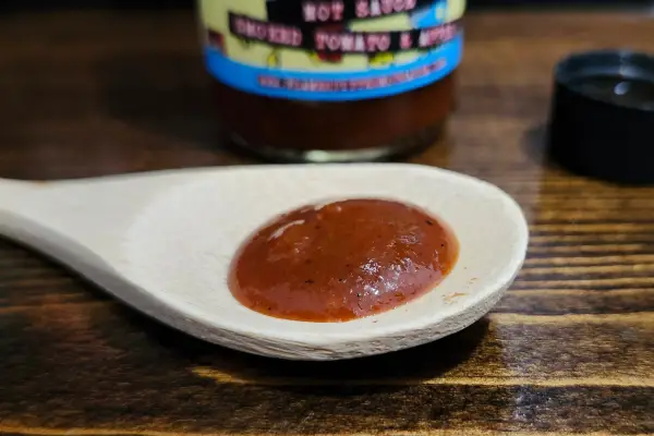 Smoked Tomato and Apple Hot Sauce by Flamespitter on a spoon to show the texture