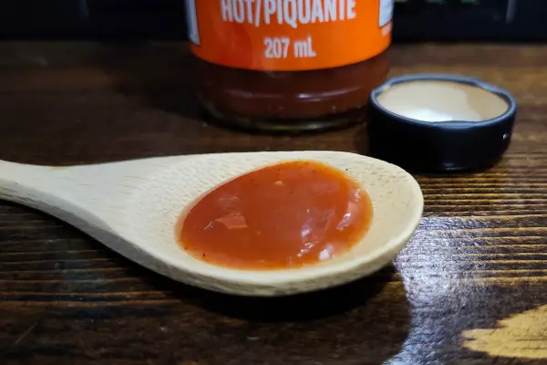 Taco Bell Hot Sauce on a spoon to show texture